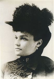 300px-Belle_Brezing_in_a_feather_hat_(circa_1895)