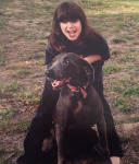 Happy girl and her dog