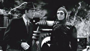 Clayton Moore (left) in Radar Men From the Moon