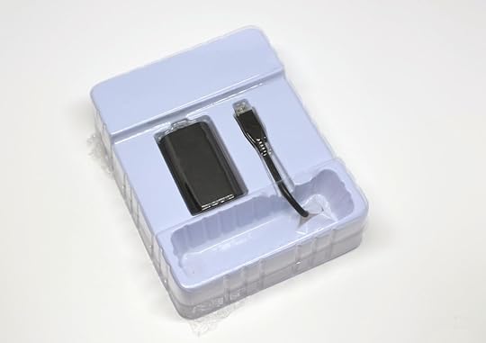 The insides of the box for the TNT Interactive T-1200 Power Core.