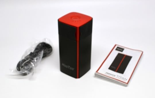 The HooToo TripMate Titan comes with a micro-USB cable, fold-out quick start guide, and the device itself.