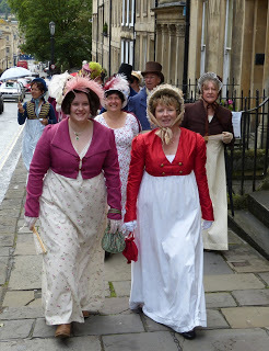 Sophie Andrews and Rachel Knowles taking part in the 2015 Jane Austen Festival Regency promenade © Andrew Knowles