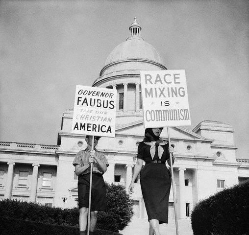 A Woman And A Child Marching