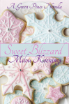 Cookies decorated with pink and blue snowflakes