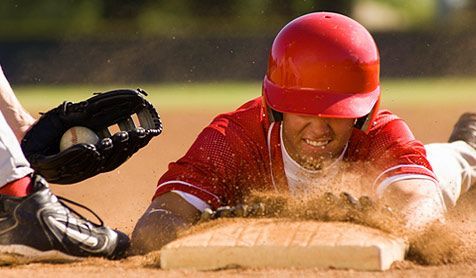 sliding in to home plate: 