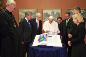 The Pope blesses the gift Bible. On left, Abbot John Klassen, Sen. Blunt and Dr. Billington; on right, Speaker Boehner, SJU President Michael Hemesath and GHR Foundation CEO Amy Goldman. Photo by Heather Reed, Office of the Speaker