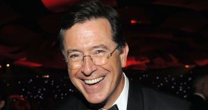 Colbert laughing
