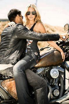 couple on a motorcycle: