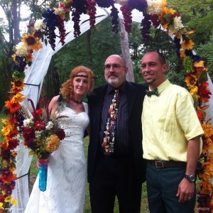 Reverend Keene and the happy couple.