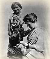 Amy Carmichael, missionary to India with two of the children in her care