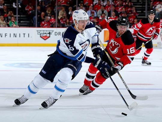 Mark Scheifele heads to the net.