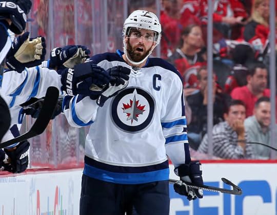 Captain Andrew Ladd celebrates a power play goal.