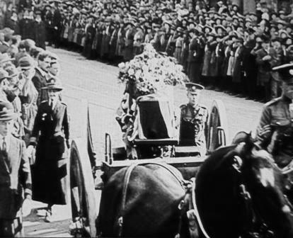 A horse-drawn caisson carries Edith Cavell's coffin through the streets of Norwich in 1919