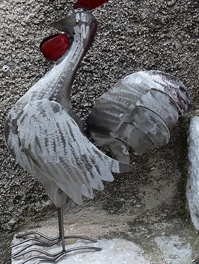 In my opinion, this attractive metallic chicken outside a boutique in the Côte d'Azur had reason to strut.