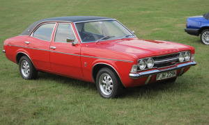 Photo of old ford cortina mark 2 in red with a black top