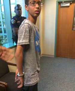 Photo of boy in handcuffs