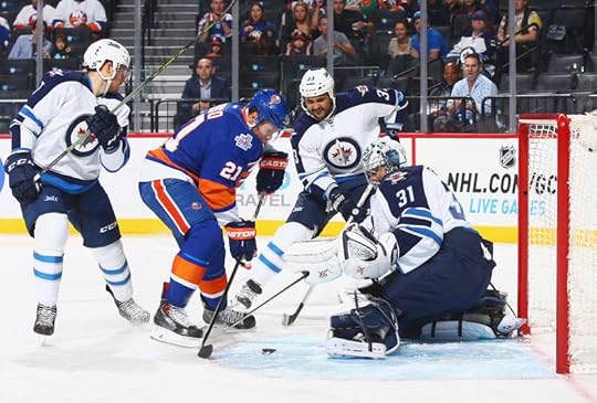 Pavelec foils the Islanders Kyle Okposo
