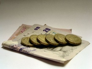 Pile of Coins and Cash