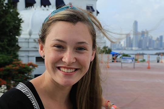 woman-smling-skyline-panama-city