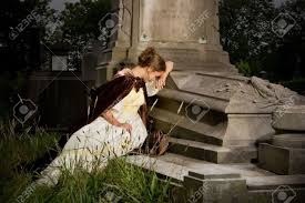 woman at a grave