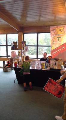 Tristan the Teddy Bear and me at my table at Southern Maryland Comic Con