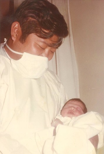 one day old with daddy