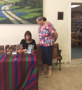 signing a book
