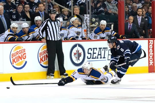Alexander Burmistov takes down Vladimir Tarasenko. Should have done it more often (Photo by James Carey Lauder)