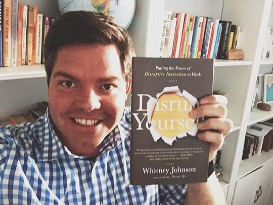 Richie Norton with the book Disrupt Yourself by Whitney Johnson