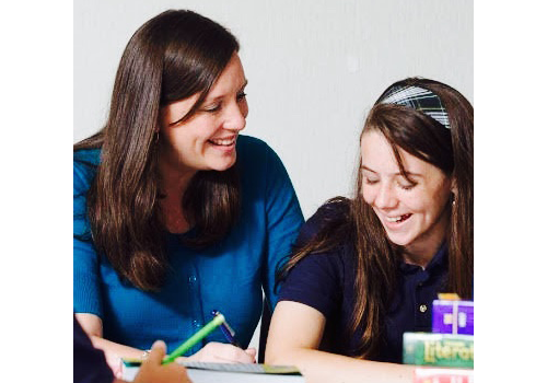 Marie Graham with a student