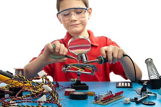 Boy tinkering with inventions