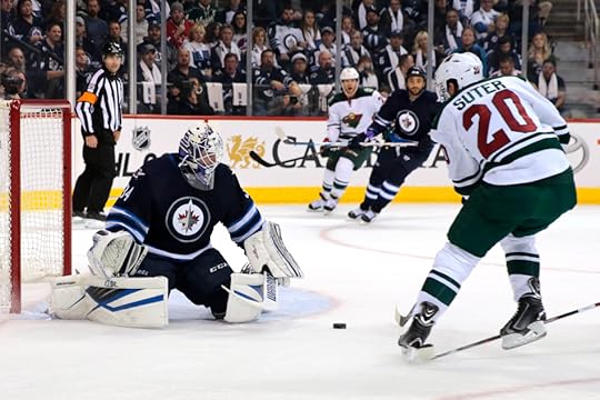 Hutchinson foils Ryan Suter (Photo by James Carey Lauder)
