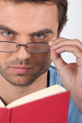 Closeup of a man reading a book