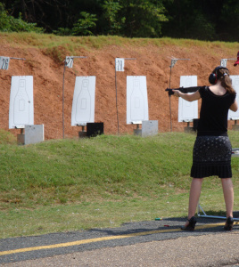 Liz shooting gun