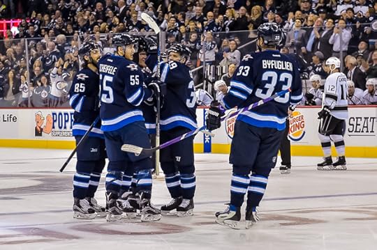 Jets celebrate Nikolaj Ehlers goal. (Photo by Tara Miller).