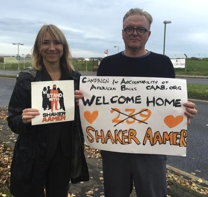 Joanne MacInnes, the co-director of We Stand With Shaker and campaigner Andrew Jackson at Biggin Hill airfield for Shaker Aamer's return home from Guantanamo.