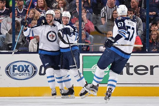 Andrew Copp celebrates his first NHL goal.