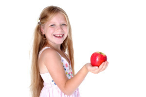 adorable little girl with apple