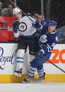 Winkler's Byron Frose battles the Jets Jacob Trouba