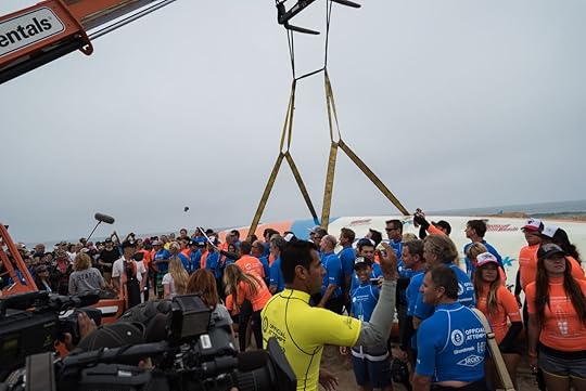Team Leader Rocky McKinnon (in yellow) organizing the group of 66 surfers.