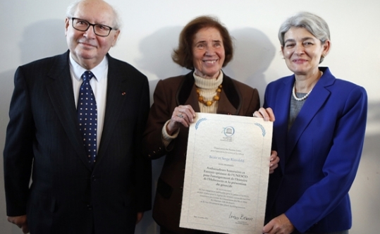 Serge Klarsfeld, 80, a French historian, lawyer and Holocaust survivor, and his 76-year-old German-born wife Beate Klarsfeld, along with Director-General of UNESCO, Irina Bokova posing after being named UN special envoys and honorary ambassadors on genocide prevention at UNESCO headquarters in Paris, Oct. 26, 2015. Photo by Francois Mori/AP Images via JTA