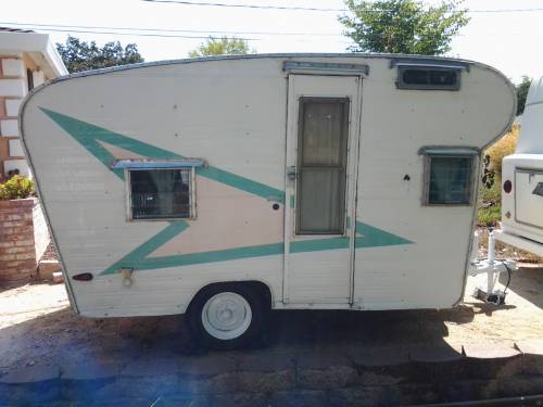 1965 13-ft Scotsman travel trailer like the one we owned (photo from tincantourists.com)