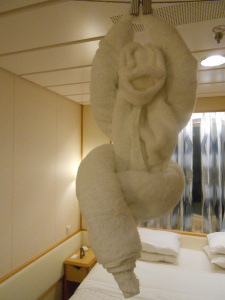 Towel monkey hanging from ceiling