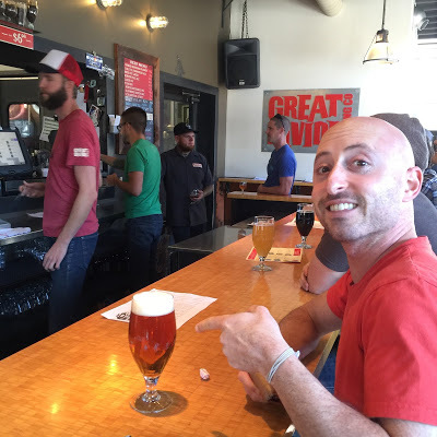 Benjamin Rubenstein sampling Titan IPA at Great Divide Brewery in Denver