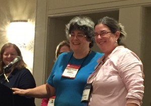 Mystery Writers of America Executive Vice President Donna Andrews presents me with a ribbon recognizing me as one of the 22 debut novelists at the 2015 New England Crime Bake.