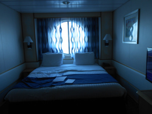 Stateroom with a porthole.
