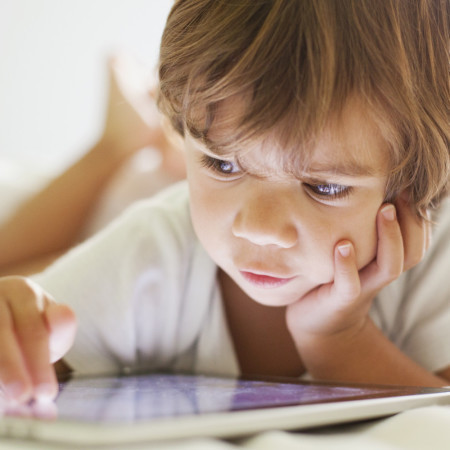 Small boy using a tablet