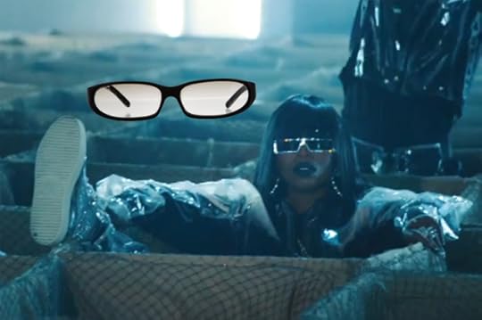 man-repeller-missy-elliot-2000s-sunglasses-vintage-prada-shades-the-real-real
