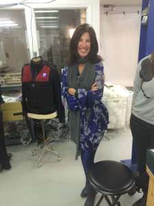The impeccably dressed Noreen Landry calls the clothing shots!