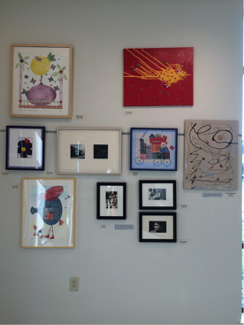 Fond du Lac Artist Association’s member of the year, Roxine McQuitty, has her own wall in this exhibit! She’s a collagist and printmaker, and much of her work is fun and whimsical!